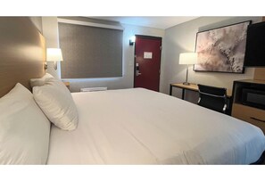Premium bedding, desk, laptop workspace, blackout curtains - Studio 6 Suites Warsaw, IN  (Warsaw)