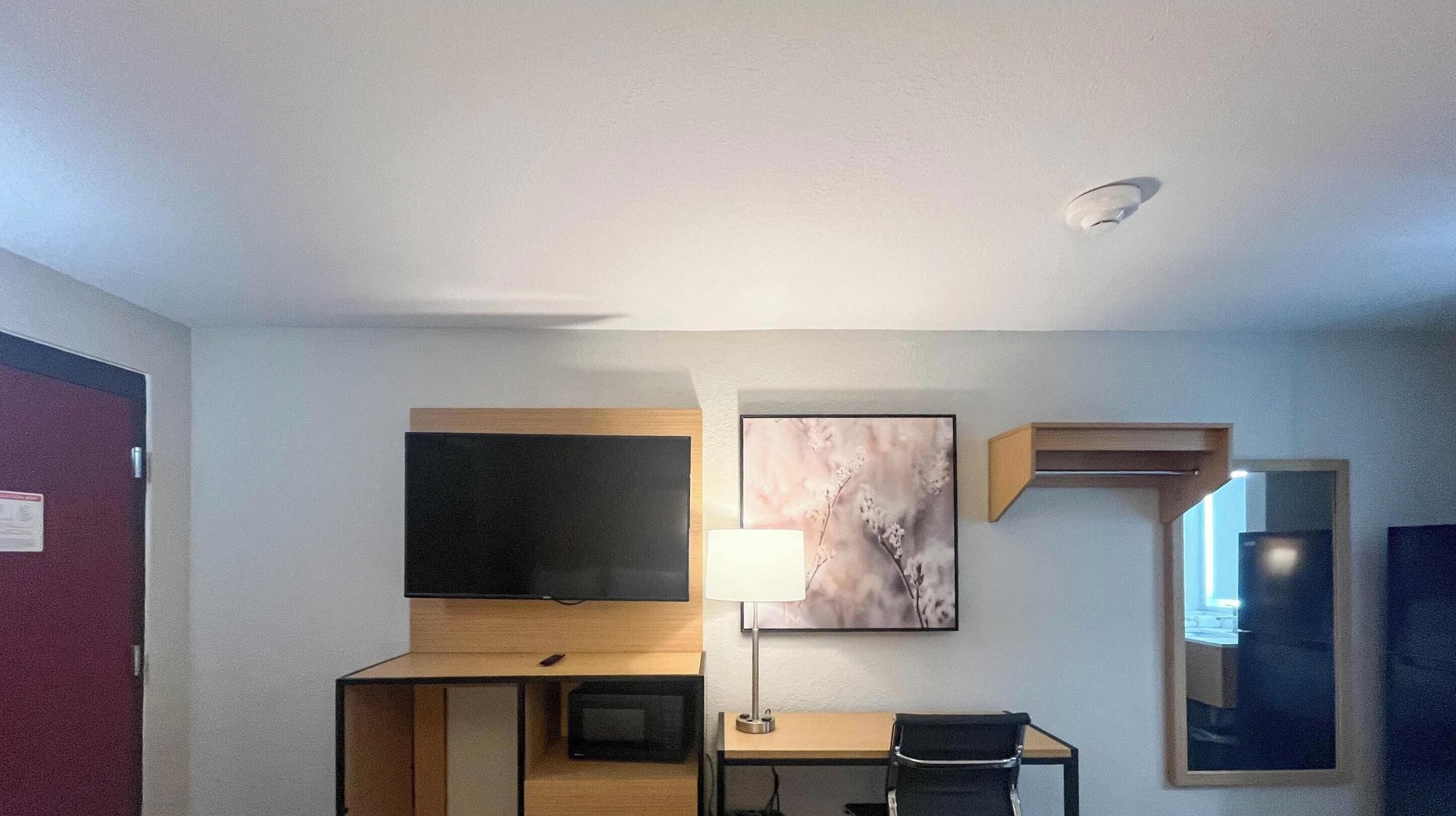 Premium bedding, desk, laptop workspace, WiFi (free)