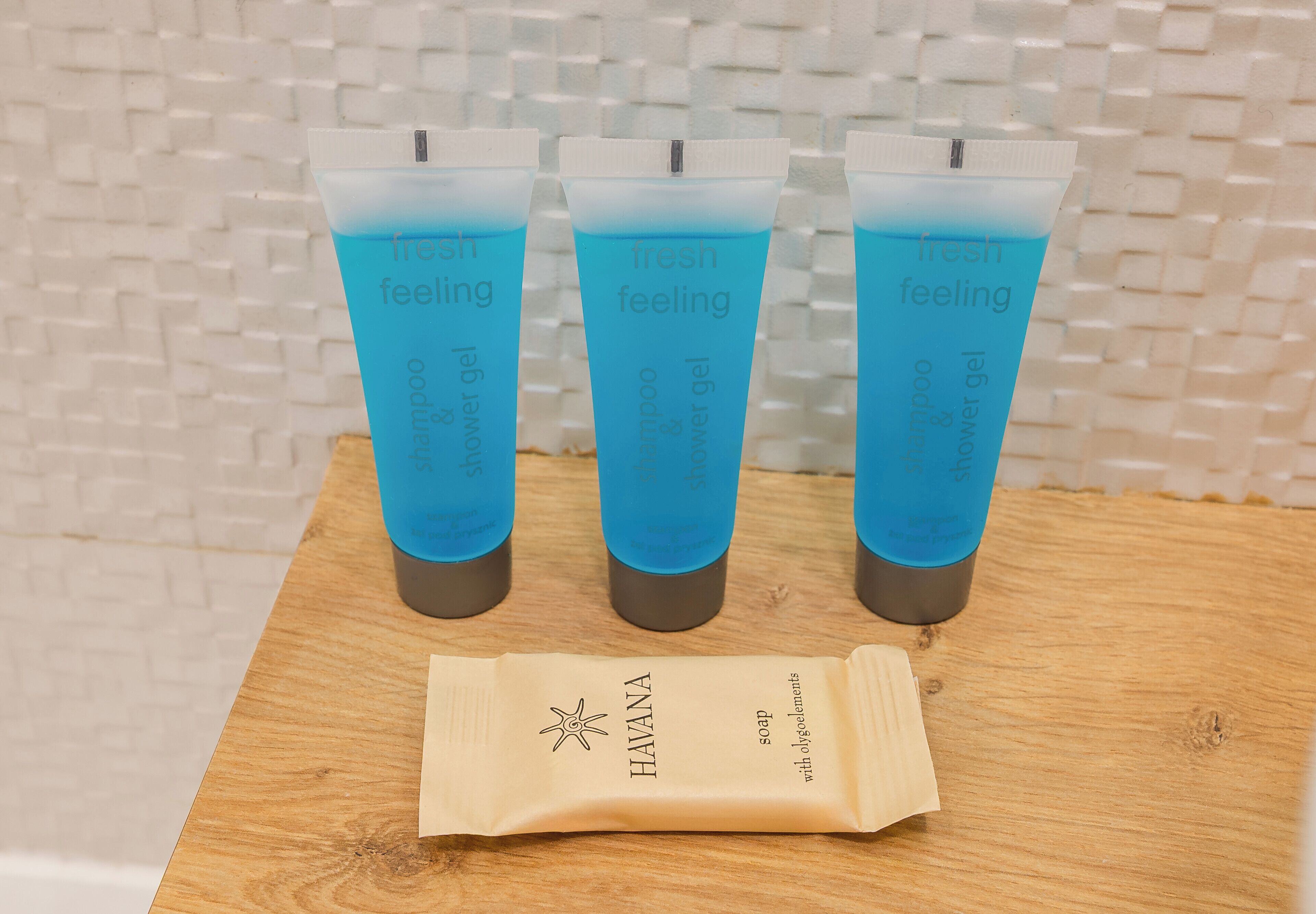 Three tubes of 'fresh feeling' shampoo and conditioner, and a packet of 'HAVANA' soap with organic elements.