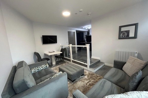 Lounge — Bright open-plan living space to unwind after a day on the NC500