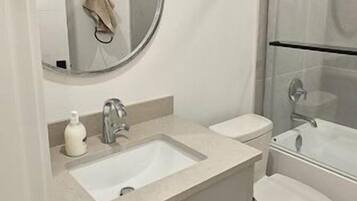 Hair dryer, towels, soap, toilet paper