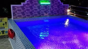Outdoor pool, open 8:00 AM to 11:00 PM, free cabanas, pool umbrellas