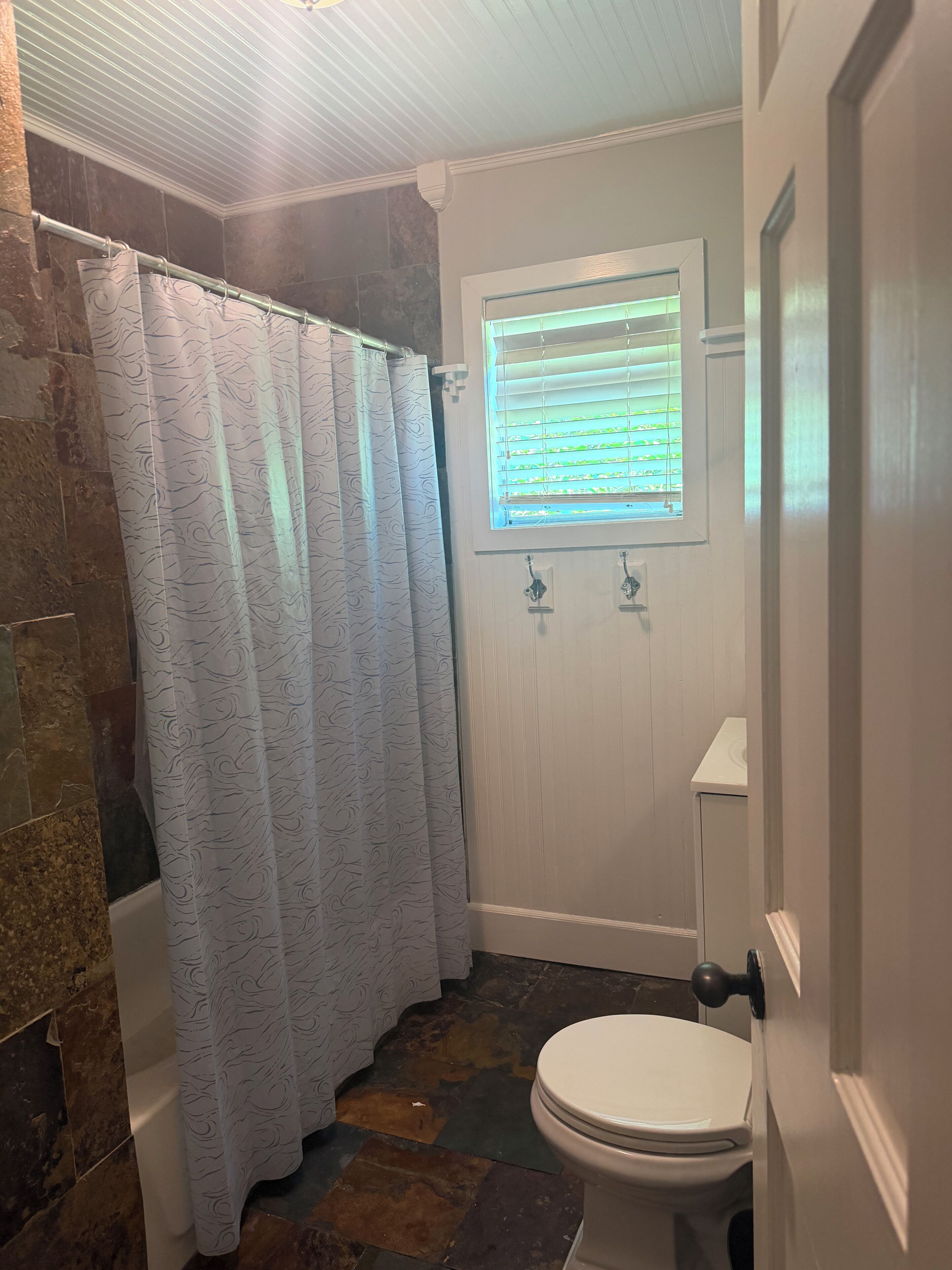Townhome, City View | Bathroom | Separate tub and shower, free toiletries, hair dryer, slippers