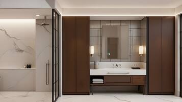 Un baño moderno con una bañera independiente, un espejo grande y un tocador con lavamanos.
