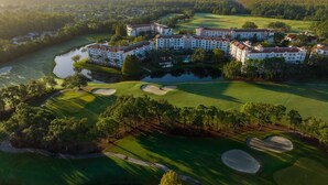 An aerial view of a golf course with a large hotel complex. - Christmas in Florida! 2 Bedroom, 2 Bath Villa – Marriott’s Grande Vista, Orlando (Orlando)