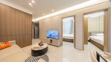 Family Suite, Balcony, City View | Desk, laptop workspace, free WiFi