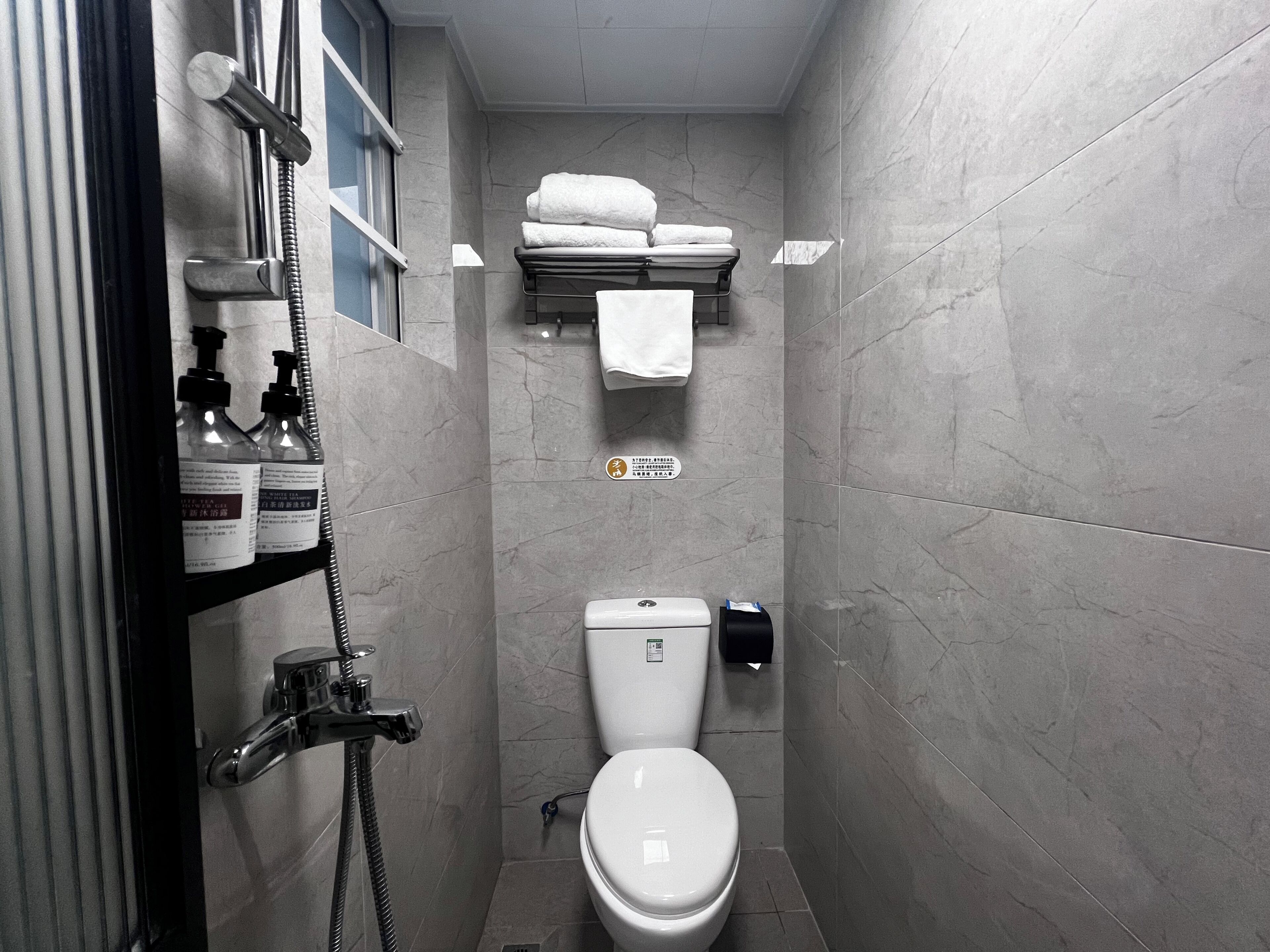 Shower, free toiletries, hair dryer, towels