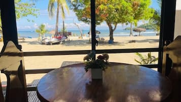 Villa, Balcony, Beach View | Outdoor dining