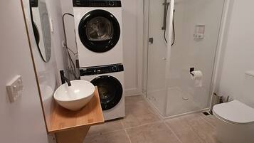 Hair dryer, towels, soap, shampoo