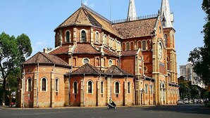A large, historic church with multiple spires and a prominent central tower. - The Rice Hotel&Tour - 39 Nguyen Trai No4 (Ho Chi Minh City)