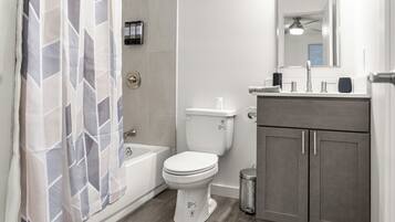 Hair dryer, towels, soap, toilet paper