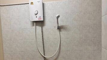 Apartment, Balcony, City View | Bathroom | Shower, towels, soap, shampoo