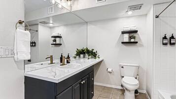 Hair dryer, towels, soap, shampoo