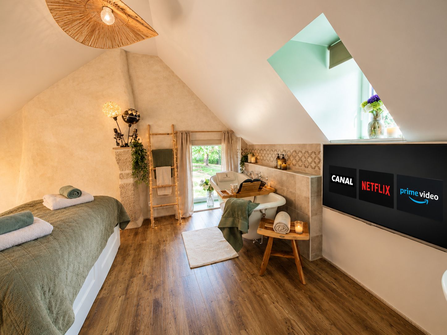 A bedroom with a sloped ceiling, a wooden ladder, a bathtub, a vanity with a mirror, and a TV displaying streaming services.