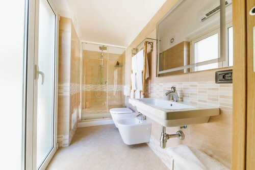 A stone's throw from the beach and pine forest, an 'oasis of peace with garden
