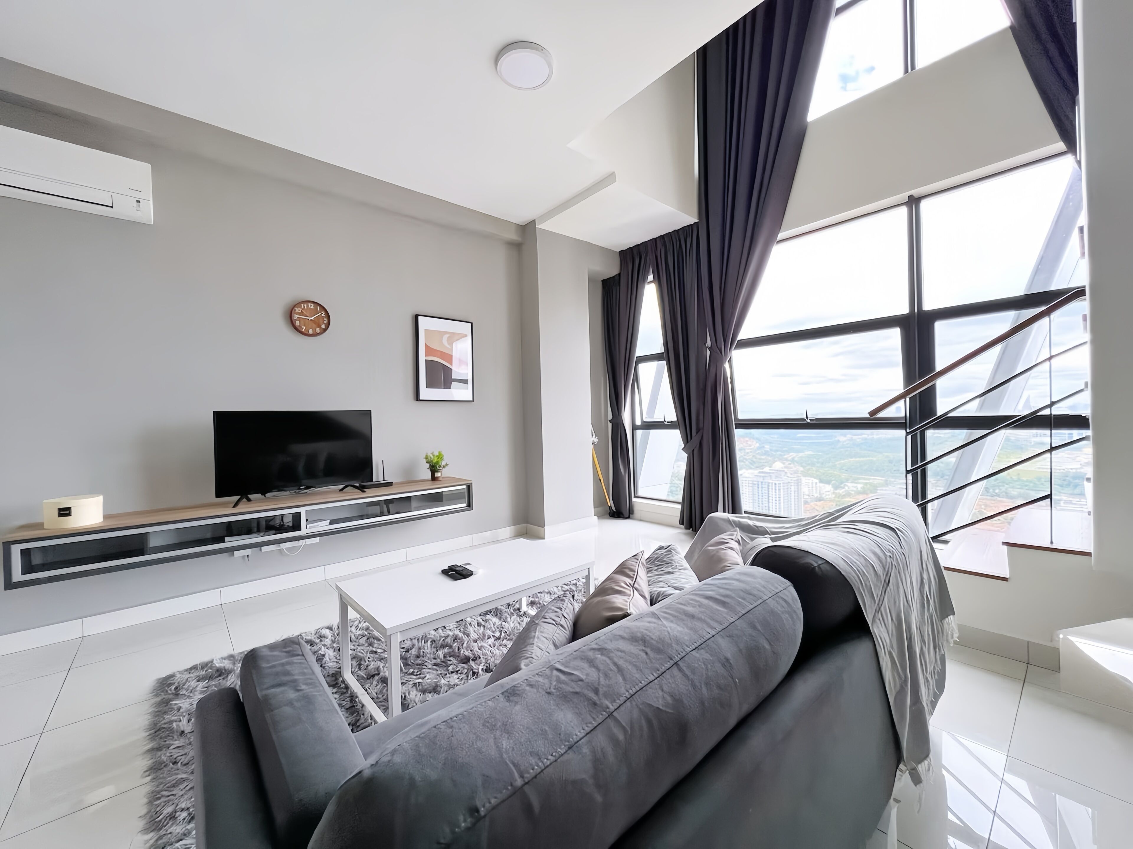 Deluxe Duplex, 2 Bedrooms | Living area | 43-inch LED TV with digital channels