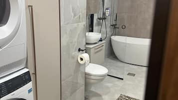 Superior Apartment, 3 Bedrooms, Courtyard View | Bathroom | Separate tub and shower, rainfall showerhead, hair dryer, bidet