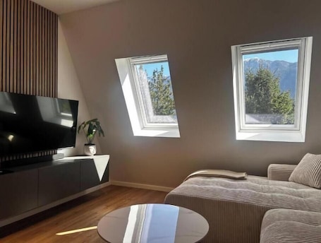 Living area. Stylish Mountain Apartment with Balcony & Alpine Views in Bovec