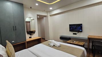 Deluxe Double Room, City View | In-room safe, desk, laptop workspace, iron/ironing board