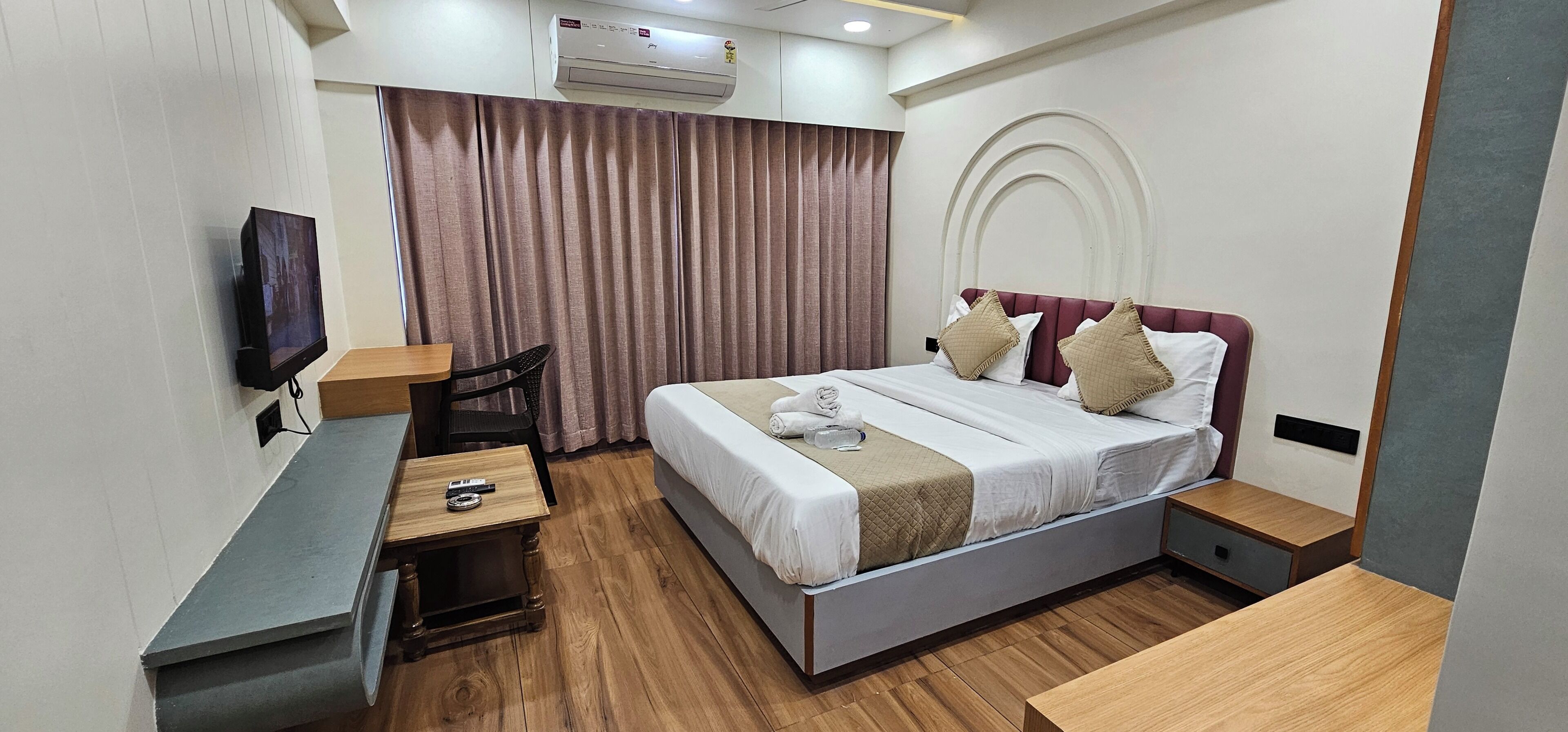 Deluxe Double Room, City View | In-room safe, desk, laptop workspace, iron/ironing board