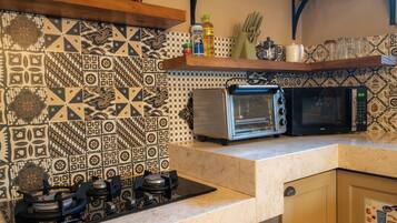 Villa | Private kitchen | Dining tables