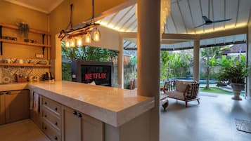 Villa | Private kitchen | Dining tables
