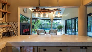 Villa | Private kitchen | Dining tables