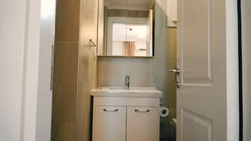 Apartment, 1 Bedroom, Garden View | Bathroom | Shower, free toiletries, towels, soap