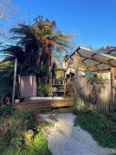 The Big House, a sanctuary in a lush valley bordering the Abel Tasman NP.