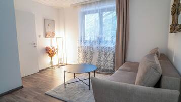 Apartamento superior | Zona de estar