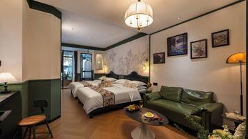 Family Twin Room, City View | Minibar, individually decorated, blackout curtains, soundproofing
