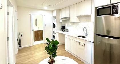 Cozy new 2-bedroom suite with AC & big private yard in charming Burnaby