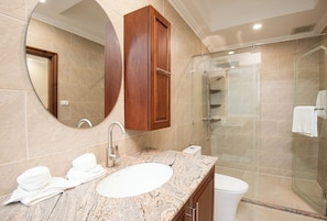 A bathroom with a marble sink, a large mirror, a wooden cabinet, and a glass shower enclosure. - #1 Luxury 4BR Resort Poolvilla Pratamnak Residence (Pattaya)