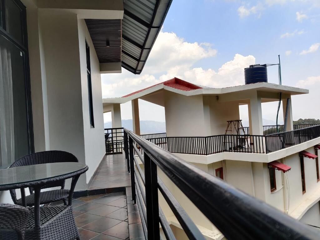 Deluxe Double Room, Balcony, Mountain View | Outdoor dining
