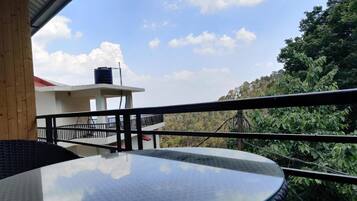 Deluxe Double Room, Balcony, Mountain View | Outdoor dining