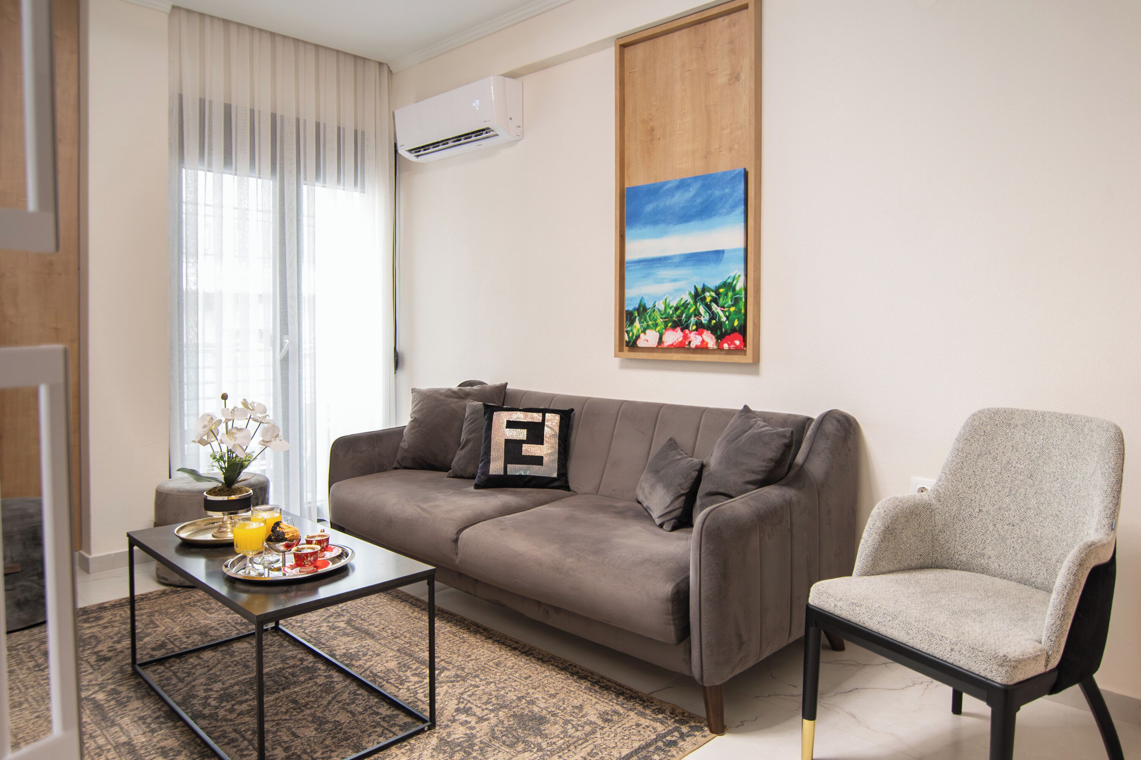 Apartamento standard, sacada, vista para a cidade | Área de estar