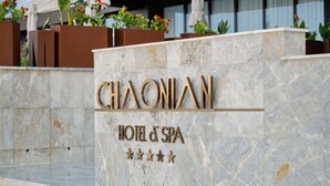 A hotel sign with the name 'CHAONIAN' and 'HOTEL & SPA' indicating the establishment's name and services. - CHAONIAN Hotel (Himare)