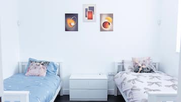 2 dormitorios, tabla de planchar con plancha, wifi gratis y ropa de cama