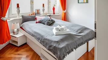 2 habitaciones, tabla de planchar con plancha, wifi y ropa de cama