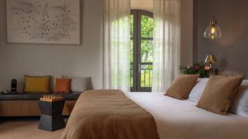 Junior Double Room, Patio, Pool View | In-room safe, soundproofing, iron/ironing board, free WiFi