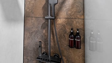 Shower, hair dryer, slippers, towels