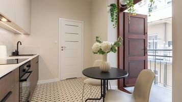 Apartment, Balcony | Private kitchenette | Coffee/tea maker, electric kettle, cookware/dishes/utensils