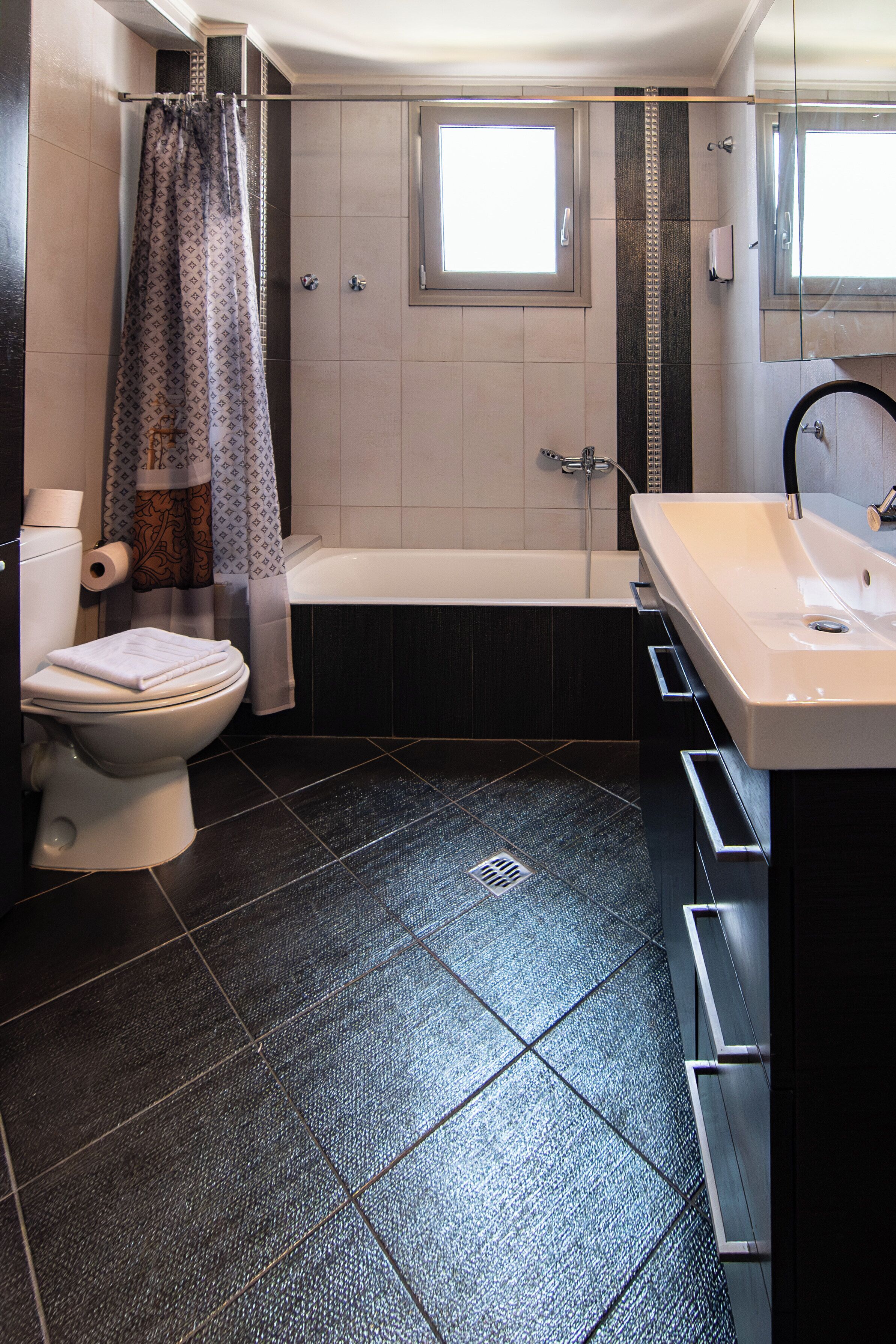Hair dryer, slippers, towels, soap
