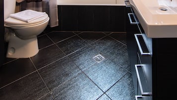 Hair dryer, slippers, towels, soap