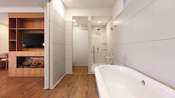 Shower, pengering rambut, sandal, dan handuk