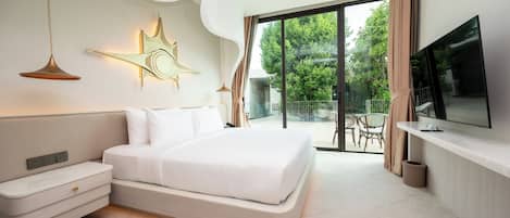 A modern bedroom with a bed, bedside tables, a TV, and a balcony with outdoor furniture.