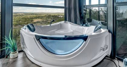 Stunning Mirror-Glass Retreat with Spa Tub & Sunset Deck in Cottonwood, Texas