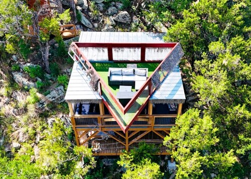 Epic Treehouse Escape with Multi-Level Deck & Hanging Bed in Cottonwood, Texas