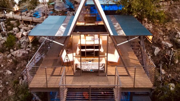 Unclassified image, 1 of 20, button - Stunning A-Frame with Folding Glass Walls & Open-Air Living in Cottonwood, Texas (Cottonwood Shores)