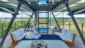 Unclassified image, 2 of 20, button - Stunning A-Frame with Folding Glass Walls & Open-Air Living in Cottonwood, Texas (Cottonwood Shores)